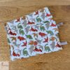pochette artisanale personnalisable range serviette de table motifs dinosaures les ptits coussins